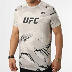 Vente flash 👍 Tee 👕 Shirt Authentic UFC Fight Week Performance Beige de Venum 🔔