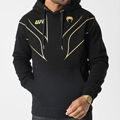 Grosses soldes 🔔 Sweat Capuche Fight Night Noir Doré de Venum ⌛